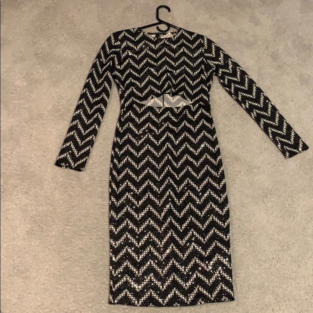 A formal dress with a stomach slit.